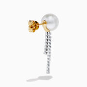 The 14K White Gold Cultured Pearl and Diamond Drop Earrings feature round cultured pearls atop two vertical rows of sparkling diamonds, all set against a plain white background.