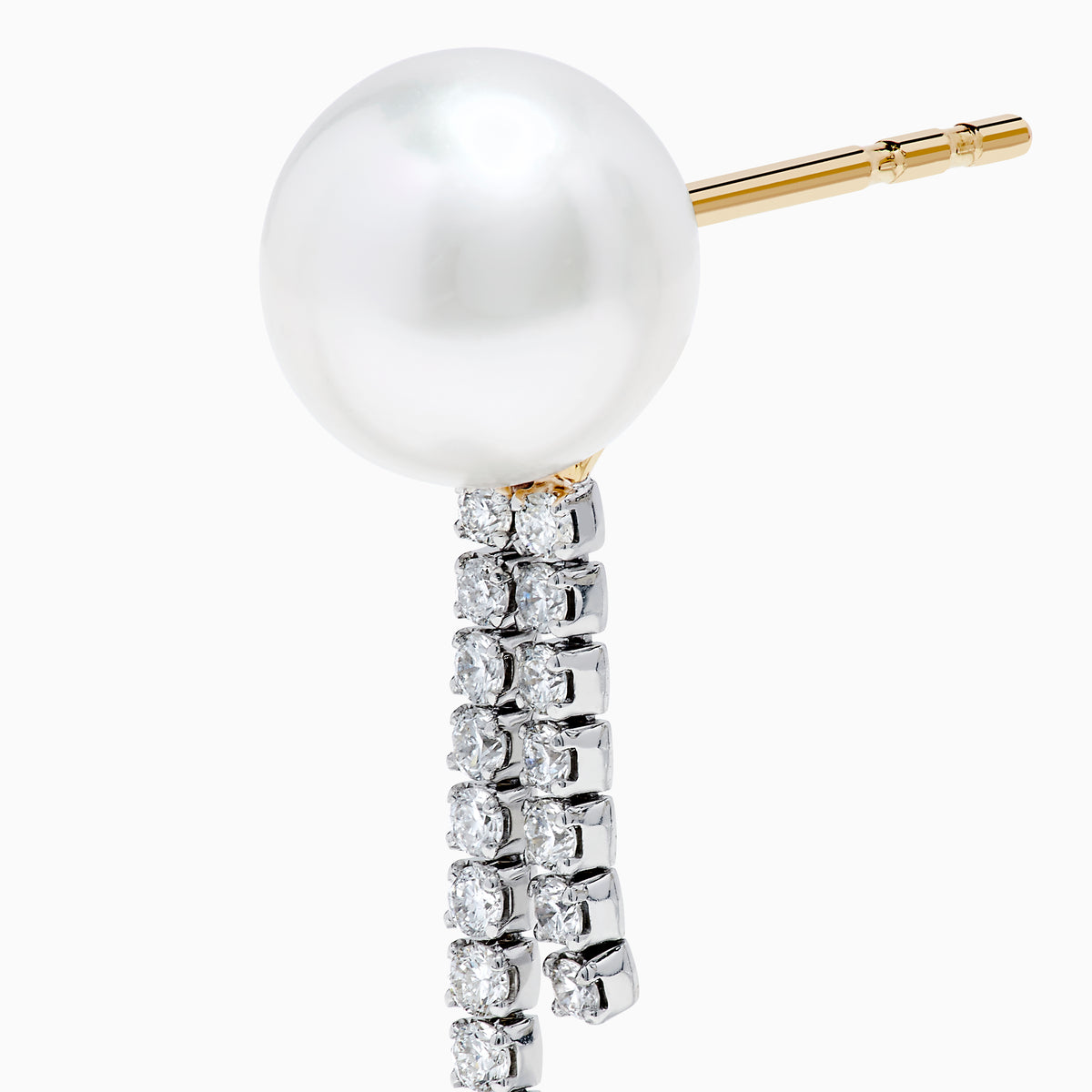 The 14K White Gold Cultured Pearl and Diamond Drop Earrings feature round cultured pearls atop two vertical rows of sparkling diamonds, all set against a plain white background.