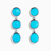 Add a modern touch to your jewelry with these 925 Sterling Silver Turquoise Drop Earrings, featuring three vibrant turquoise stones—round, square, and oval—set vertically in minimalist bezels.