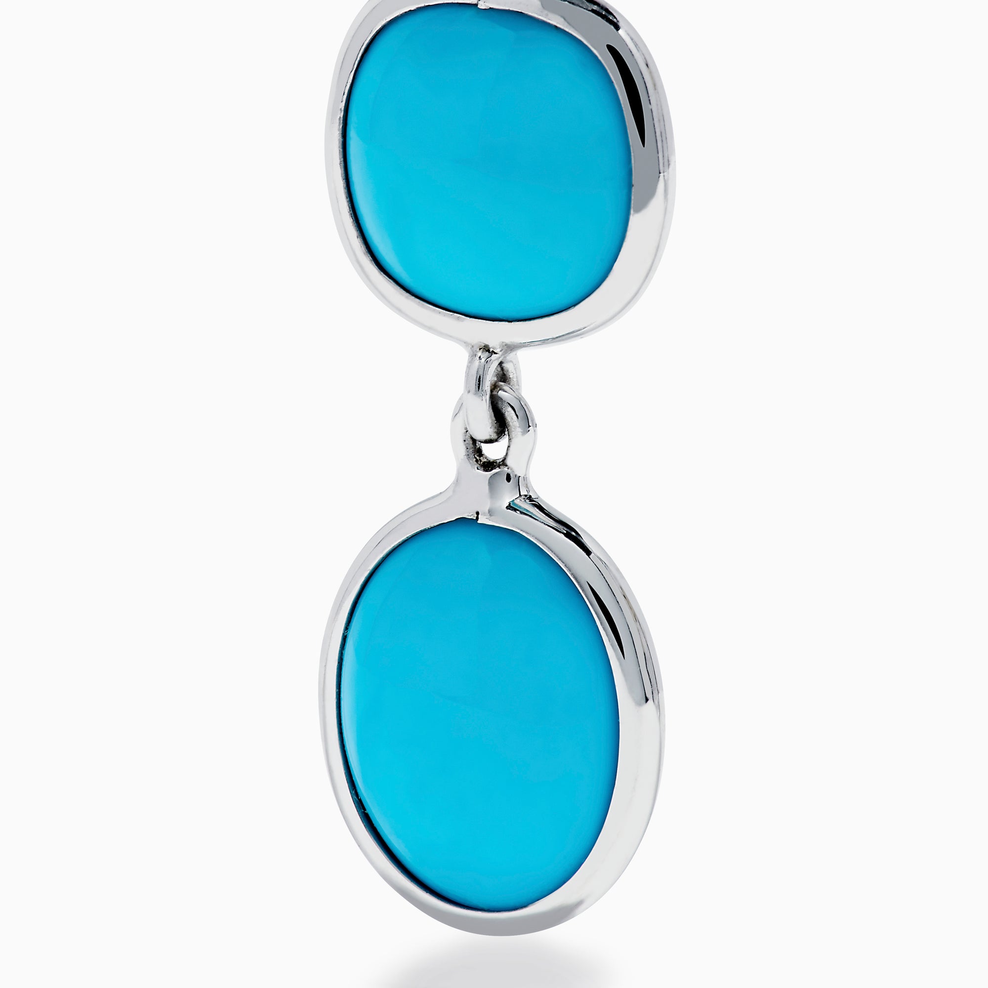 Add a modern touch to your jewelry with these 925 Sterling Silver Turquoise Drop Earrings, featuring three vibrant turquoise stones—round, square, and oval—set vertically in minimalist bezels.