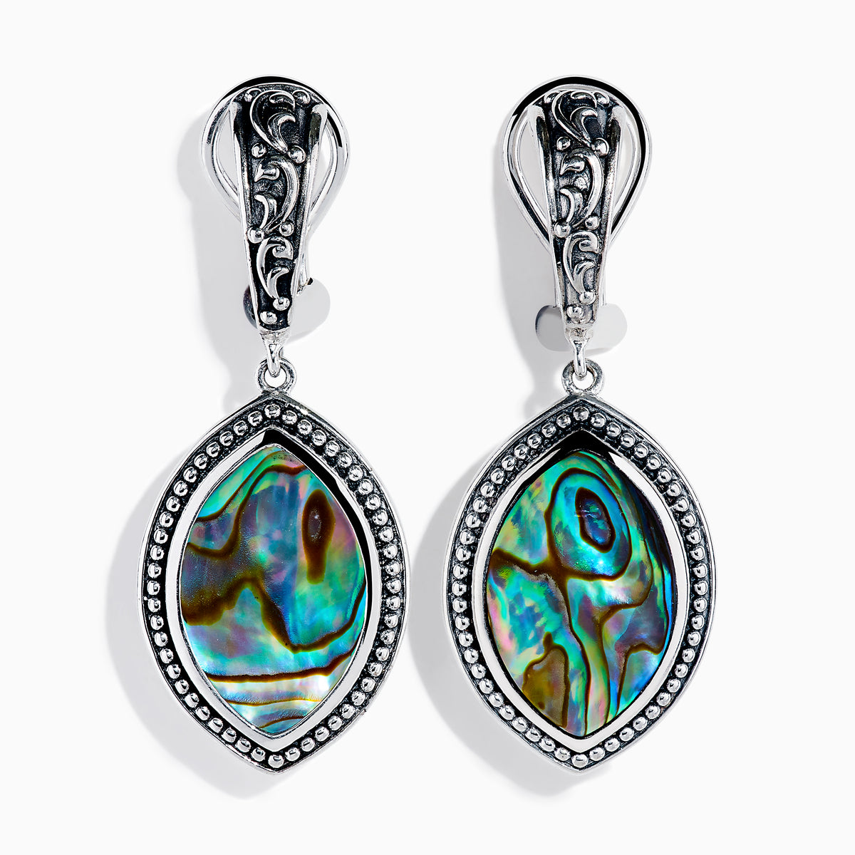 The 925 Sterling Silver Abalone Dangle Earrings feature ornate engraved tops and dangling marquise-shaped abalone shells bordered with silver beads, showcasing iridescent blue, green, and purple hues.