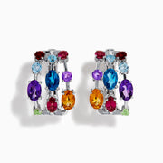 The Mosaic 925 Sterling Silver Multi Colored Gem Hoop Earrings feature three rows of vibrant blue, purple, red, orange, and green gemstones on each hoop, set against a white background.