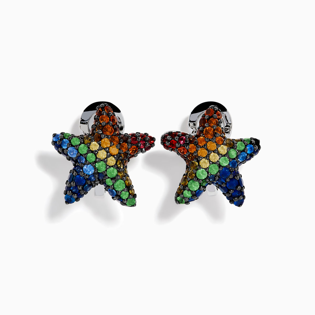 The Seaside 925 Sterling Silver Multi Color Sapphire Starfish Earrings feature star-shaped studs encrusted with sapphire gemstones in blue, green, orange, red, and yellow set in dark metal.