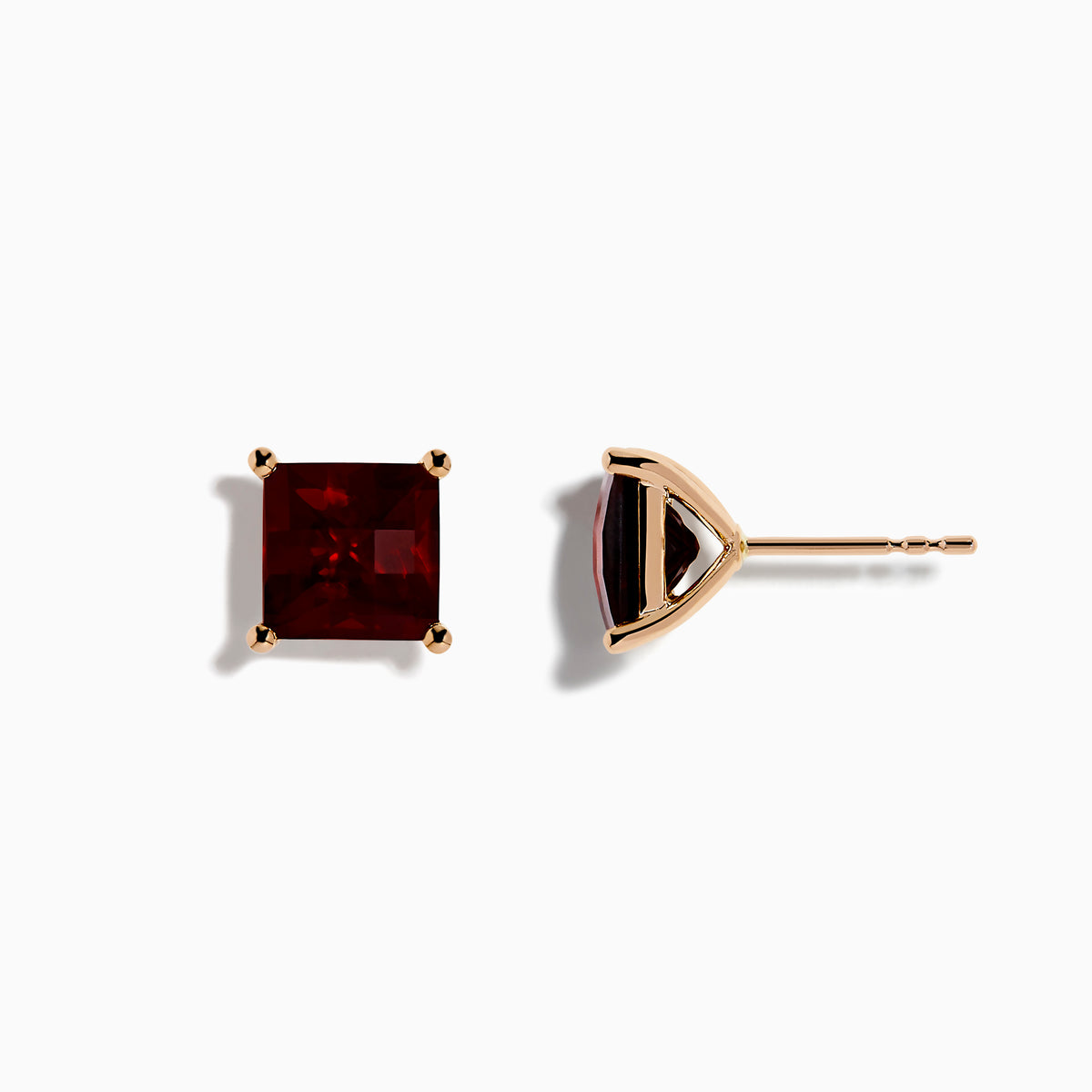 A pair of 14K Rose Gold Garnet Stud Earrings, featuring square-cut deep red garnets in gold prongs, displayed on a plain white background.