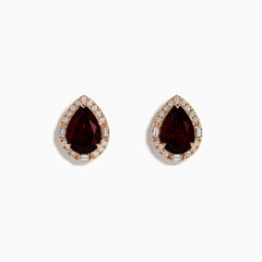 A pair of 14K Rose Gold Garnet and Diamond Earrings featuring teardrop-shaped deep red gemstones encircled by sparkling white diamonds, beautifully displayed on a white background.
