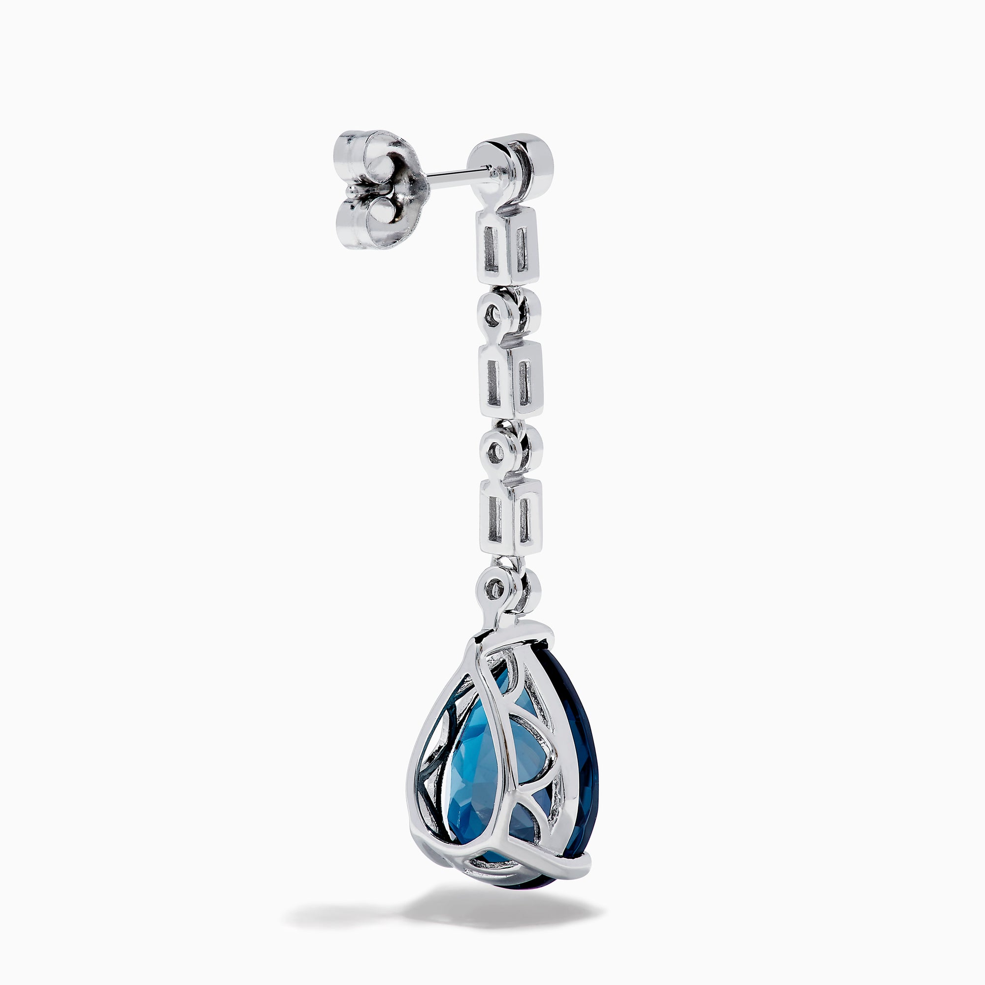The 14K White Gold Blue Topaz and Diamond Linear Drop Earrings feature large teardrop-shaped blue topaz gems with a vertical row of round and rectangular diamonds set above each stone.
