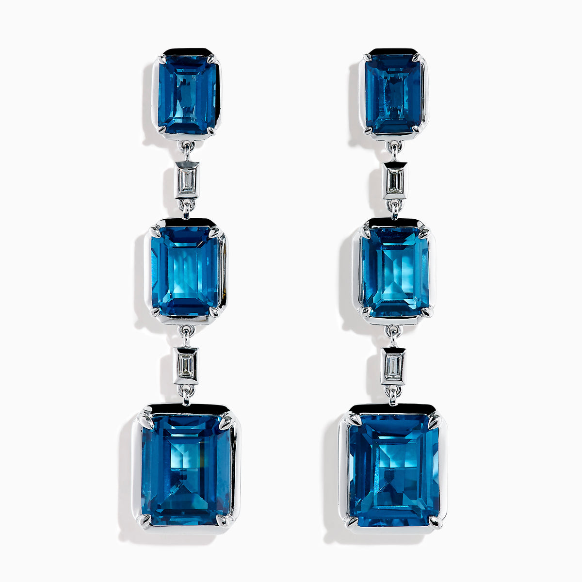 14K White Gold Blue Topaz and Diamond Linear Drop Earrings featuring three rectangular blue topaz gems and two small vertical diamonds in an alternating, linear pattern.