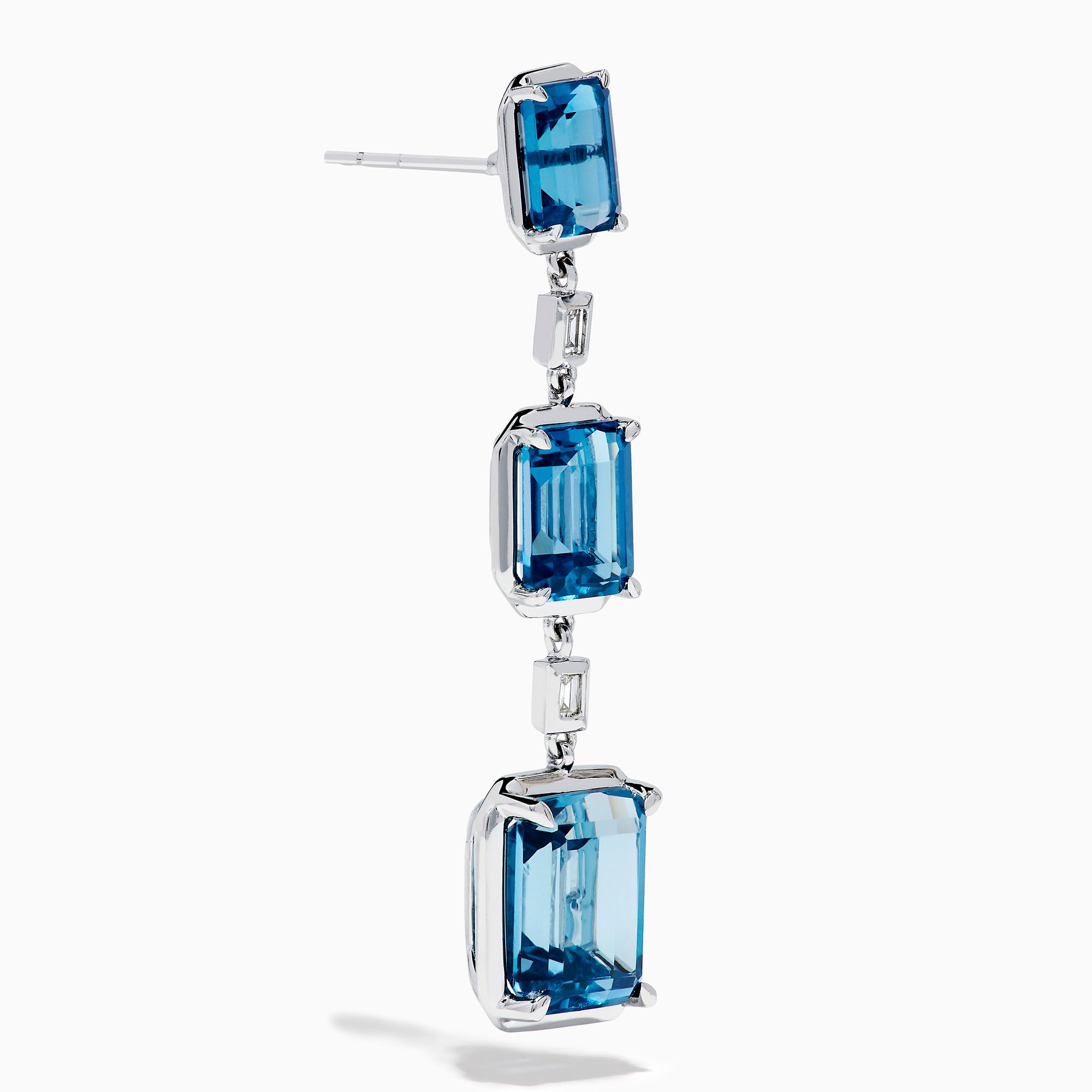 14K White Gold Blue Topaz and Diamond Linear Drop Earrings featuring three rectangular blue topaz gems and two small vertical diamonds in an alternating, linear pattern.