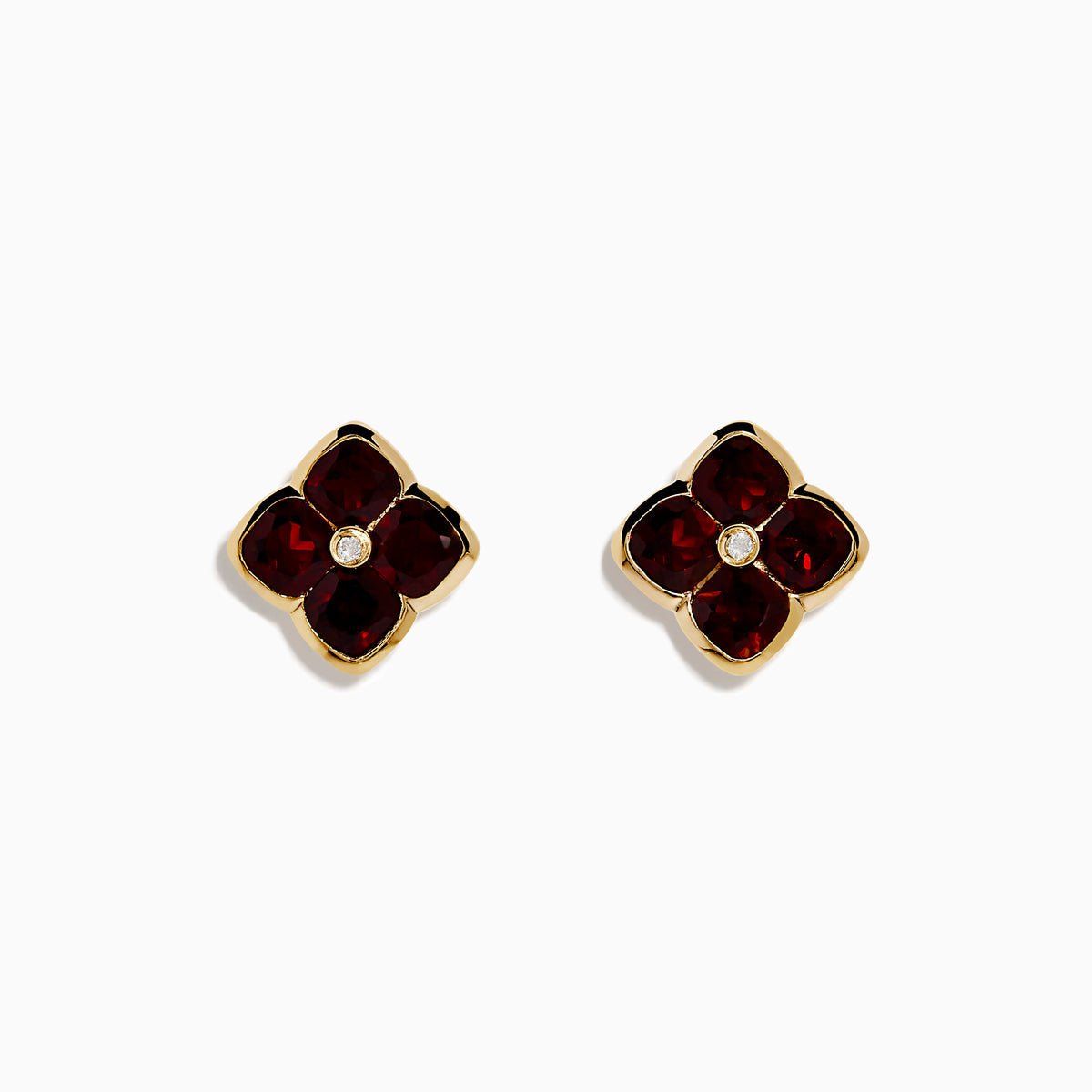 14K Yellow Gold Garnet and Diamond Earrings featuring four-petaled flower studs with deep red garnet petals and a small diamond center, shown on a white background.