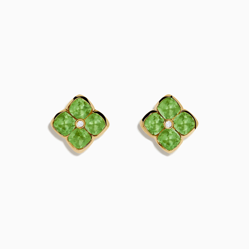 The 14K Yellow Gold Peridot and Diamond Earrings are four-petal flower studs featuring peridot gemstones on each petal with a central diamond, displayed against a white background.
