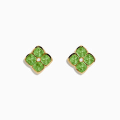 The 14K Yellow Gold Peridot and Diamond Earrings are four-petal flower studs featuring peridot gemstones on each petal with a central diamond, displayed against a white background.