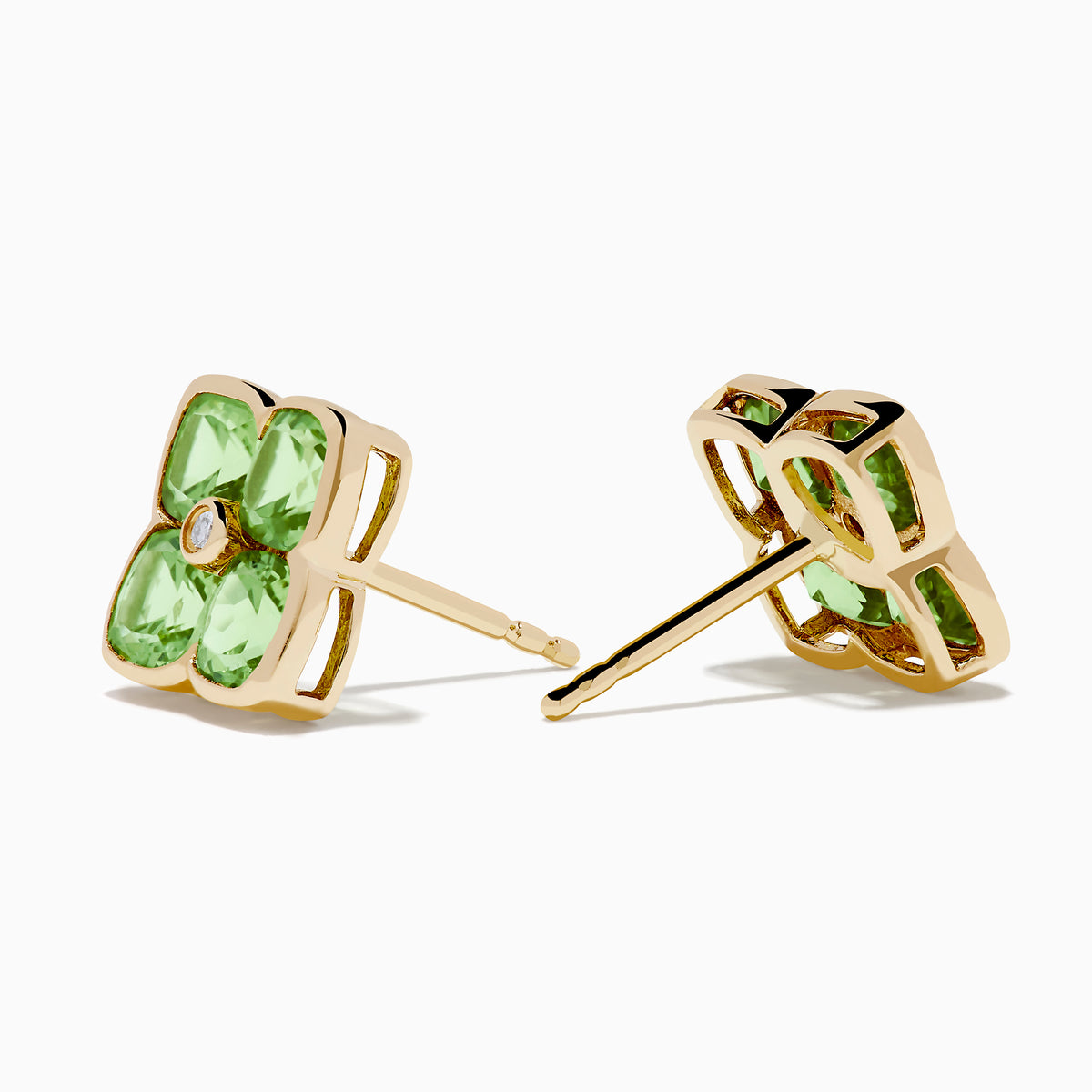 The 14K Yellow Gold Peridot and Diamond Earrings are four-petal flower studs featuring peridot gemstones on each petal with a central diamond, displayed against a white background.