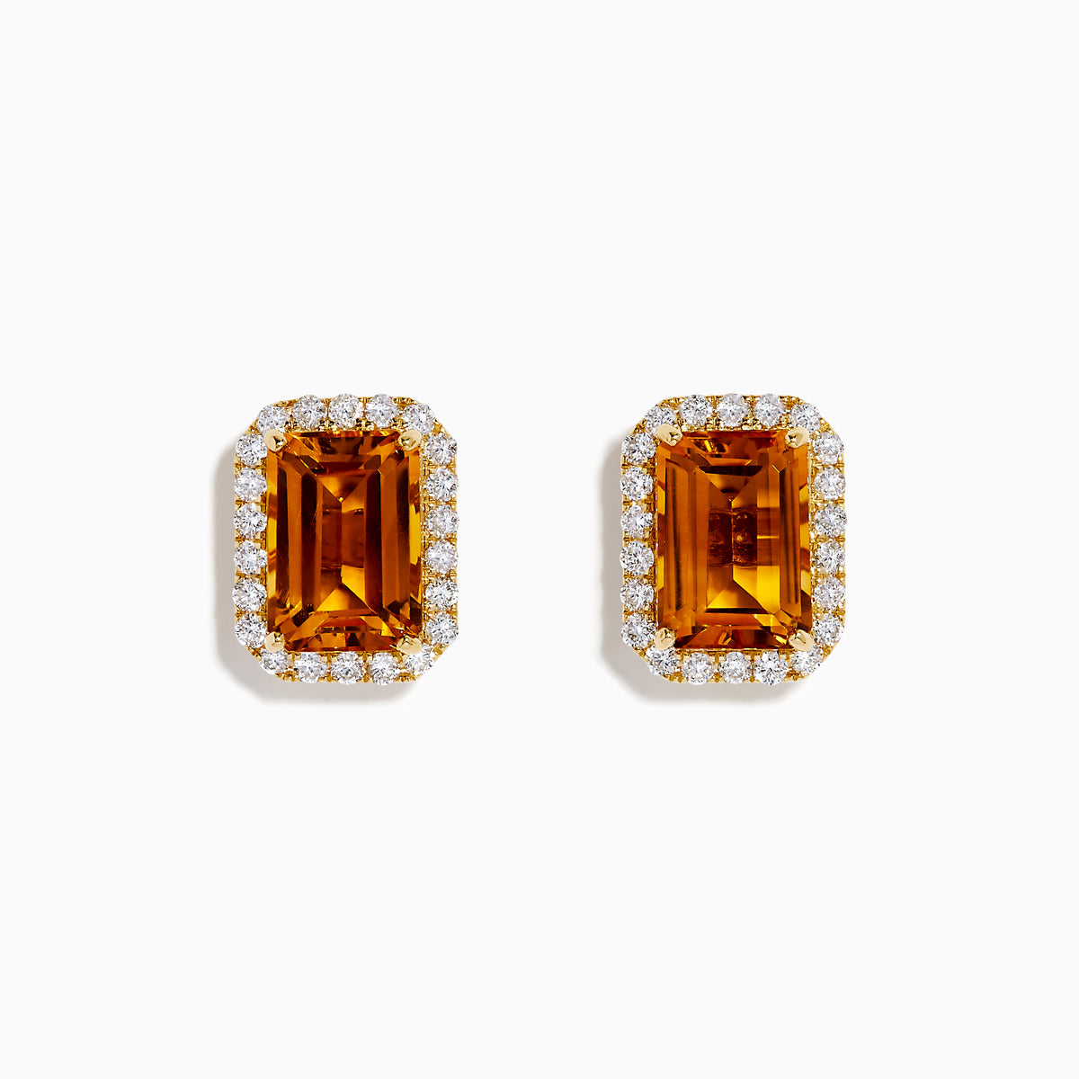 The 14K Yellow Gold Citrine and Diamond Halo Earrings feature rectangular emerald-cut citrine stones encircled by a diamond halo, displayed on a plain white background.