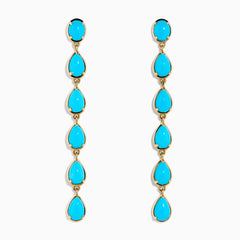 The 14K Yellow Gold Turquoise Pear Shaped Linear Drop Earrings feature four teardrop-shaped turquoise stones and a single oval stone at the top of each earring, shown against a white background.