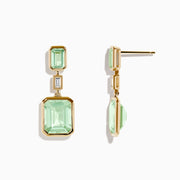 The 14K Yellow Gold Green Amethyst and Diamond Bezel Drop Earrings feature rectangular green amethysts and a vertical diamond bezel at the center, shown on a plain white background.