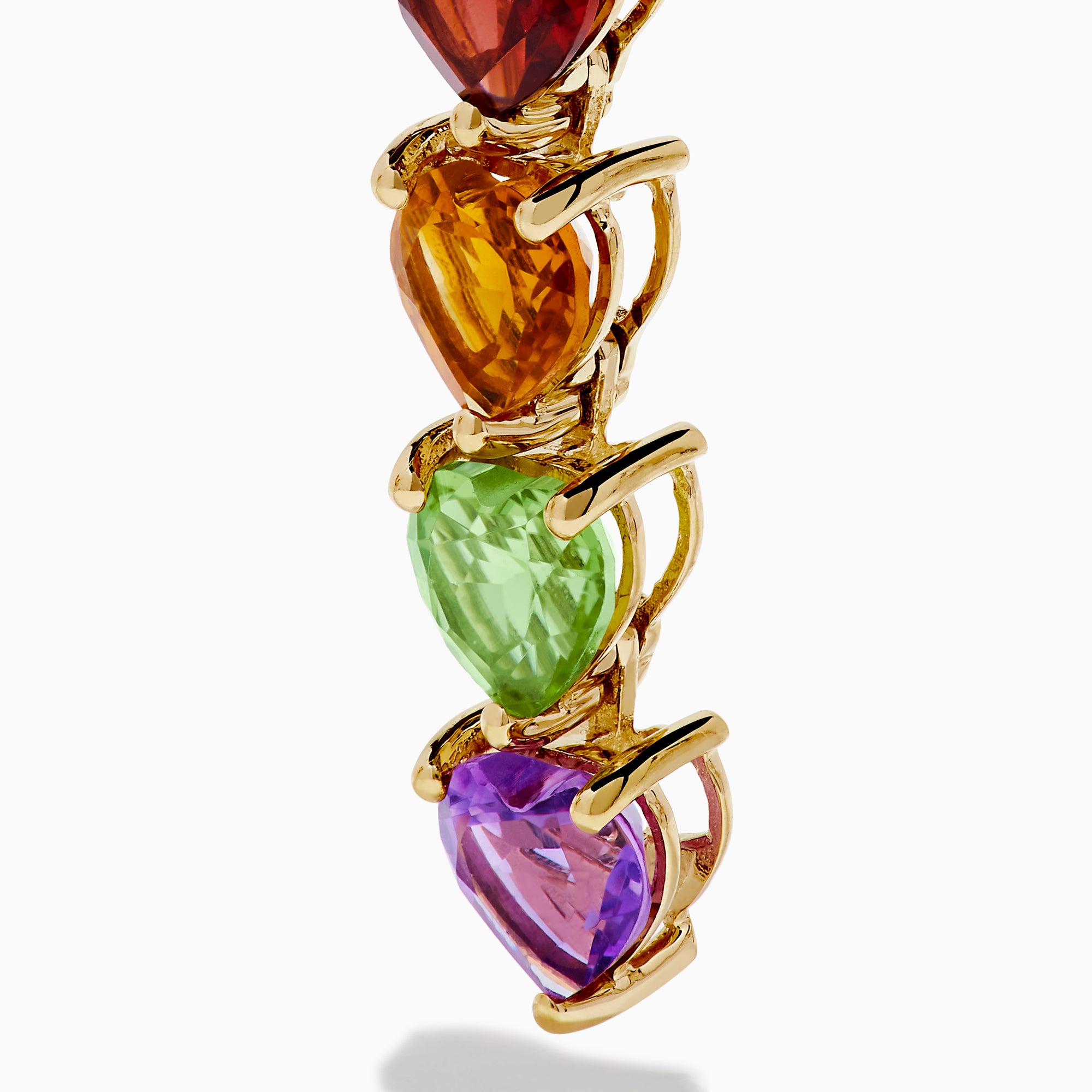 The 14K Yellow Gold Multi-Gemstone Heart Linear Drop Earrings feature five heart-shaped gems in blue, red, orange, green, and purple arranged vertically in a rainbow gradient.