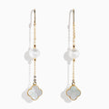14K Yellow Gold Earrings showcase a round cultured pearl and a four-leaf clover-shaped white mother-of-pearl charm, set against a white background.