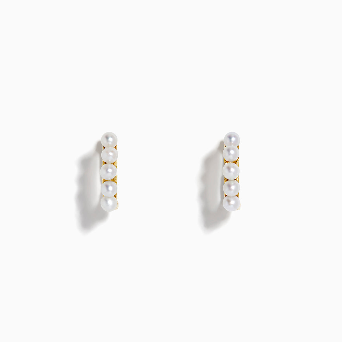 The 14K Yellow Gold Cultured Fresh Water Pearl Huggie Earrings each feature a vertical row of five small pearls and are shown against a plain white background.