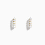 The 14K Yellow Gold Cultured Fresh Water Pearl Huggie Earrings each feature a vertical row of five small pearls and are shown against a plain white background.