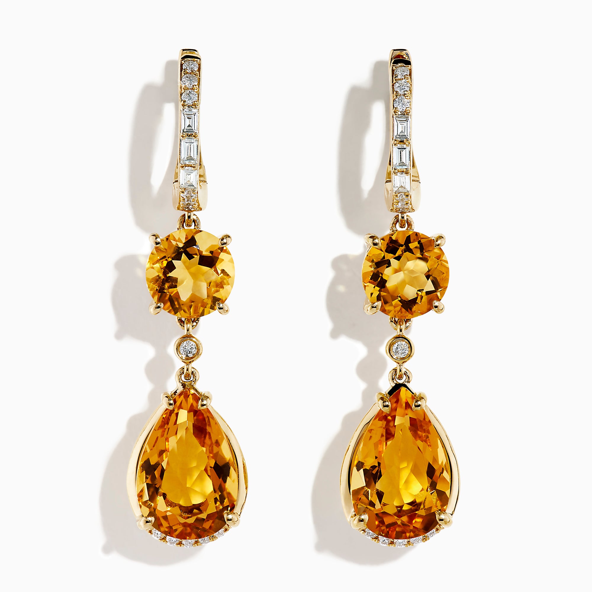 The 14K Yellow Gold Citrine and Diamond Dangle Earrings feature round and teardrop citrine gemstones with diamond accents on the clasps and between the stones, shown against a white background.