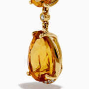The 14K Yellow Gold Citrine and Diamond Dangle Earrings feature round and teardrop citrine gemstones with diamond accents on the clasps and between the stones, shown against a white background.