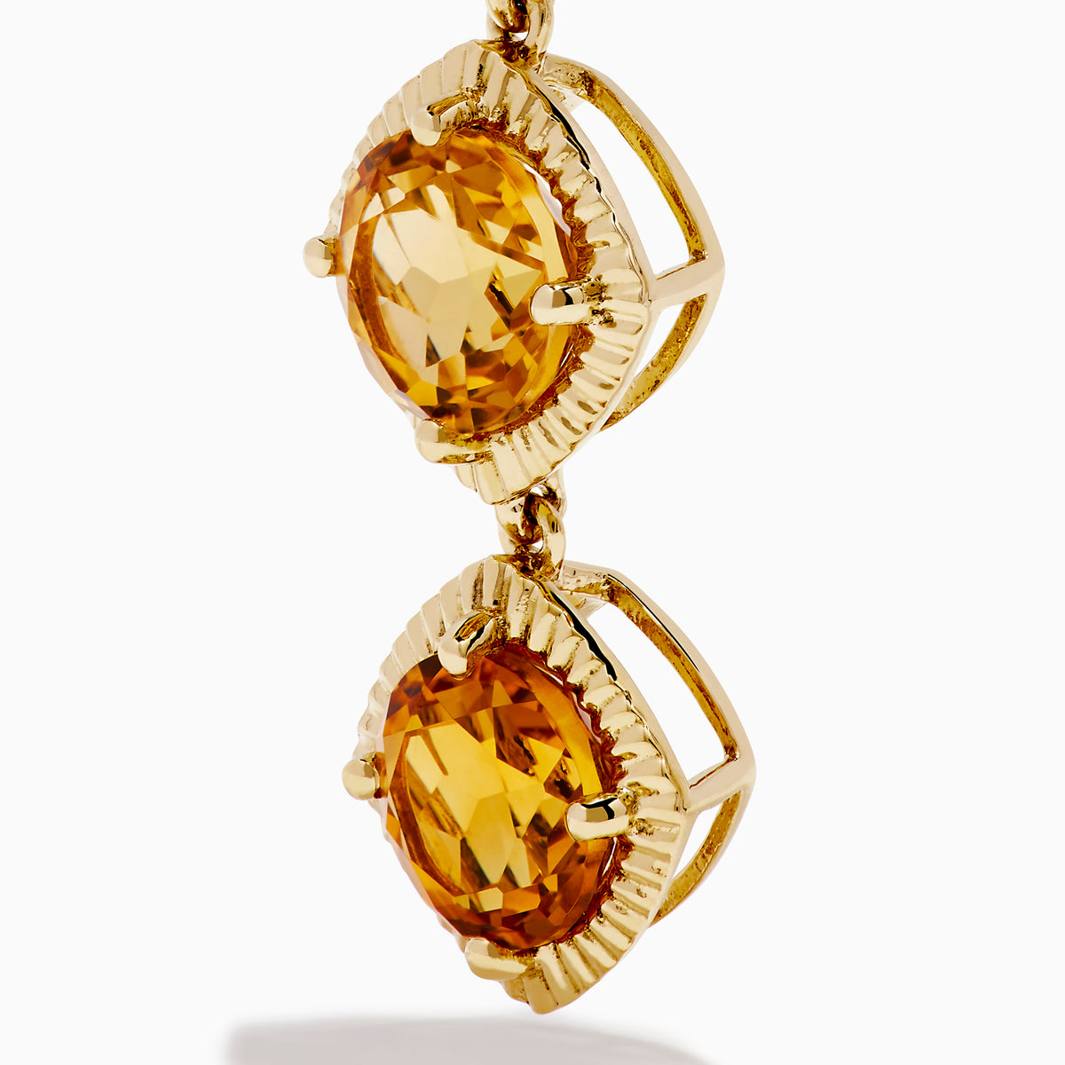 14K Yellow Gold Citrine Linear Drop Earrings feature three square, faceted citrine gemstones in each earring, set in textured gold frames and displayed on a white background.