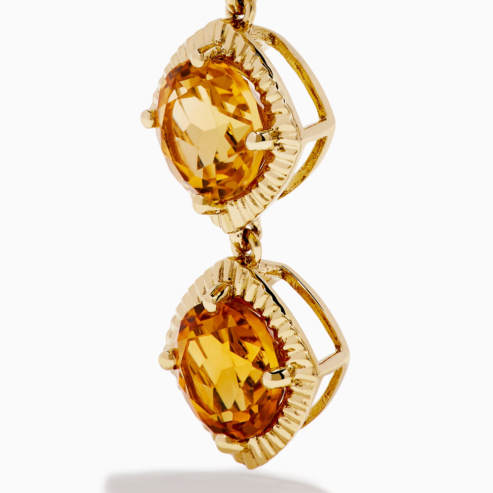14K Yellow Gold Citrine Linear Drop Earrings feature three square, faceted citrine gemstones in each earring, set in textured gold frames and displayed on a white background.