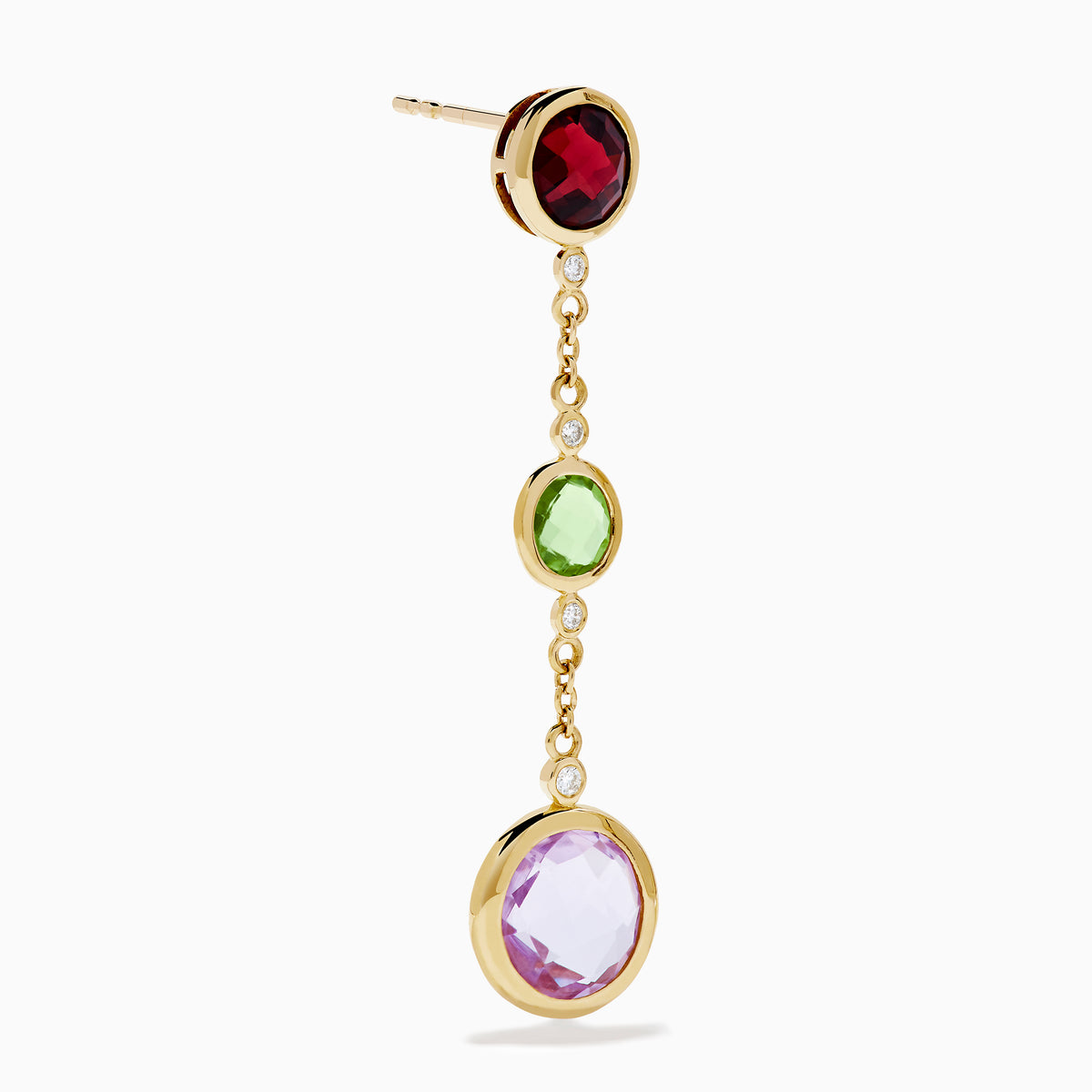The 14K Yellow Gold Diamond and Multi Color Gemstone Linear Drop Earrings feature red, green, and a larger purple gemstone with sparkling diamond accents, making these gold drop earrings a dazzling statement piece.
