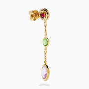 The 14K Yellow Gold Diamond and Multi Color Gemstone Linear Drop Earrings feature red, green, and a larger purple gemstone with sparkling diamond accents, making these gold drop earrings a dazzling statement piece.