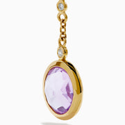 The 14K Yellow Gold Diamond and Multi Color Gemstone Linear Drop Earrings feature red, green, and a larger purple gemstone with sparkling diamond accents, making these gold drop earrings a dazzling statement piece.