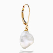 The 14K Yellow Gold Fresh Water Keshi Pearl Drop Earrings feature large, irregular Keshi pearls suspended from simple gold hooks, shown against a plain white background.