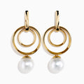 The 14K Yellow Gold Fresh Water Pearl Dangle Earrings feature a double circular design with luminous freshwater pearl drops, shown against a white background.