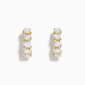 The Aurora 14K Yellow Gold Opal and Diamond Hoop Earrings feature four vertically set white opals per earring, shown against a white background.
