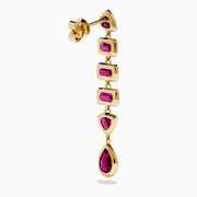 The 14K Yellow Gold Rhodolite Garnet Linear Drop Earrings feature five rhodolite garnets each in teardrop, triangle, and rectangle shapes, arranged vertically. Shown on a white background.