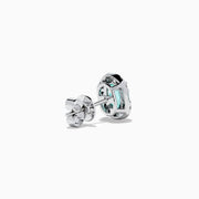 The Effy Hematian 14K White Gold Paraiba and Diamond Halo Stud Earrings feature vibrant green-blue Paraiba gemstones, each surrounded by a halo of sparkling diamonds in an elegant oval-shaped design.