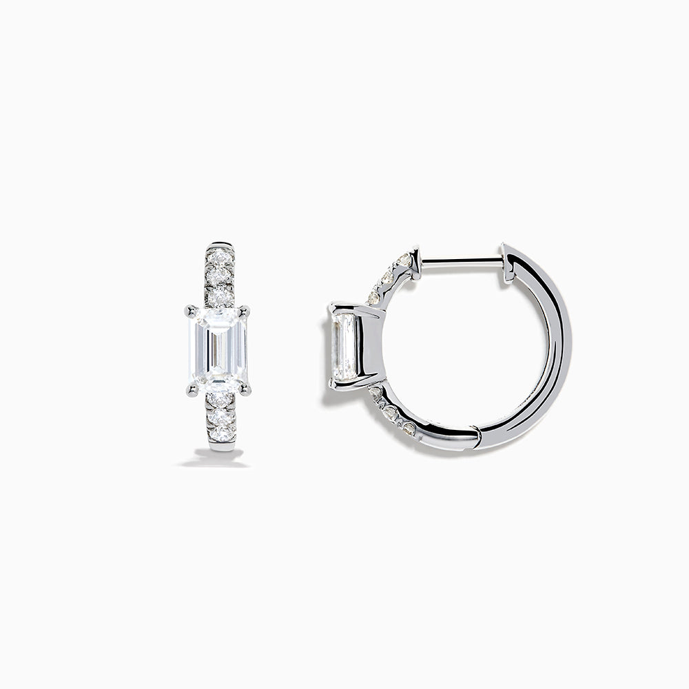 Lab Grown Diamond Emerald-Cut Huggie Earrings in 14K White Gold showcase rectangular center stones accented by small round diamonds, elegantly set and displayed against a plain white background.