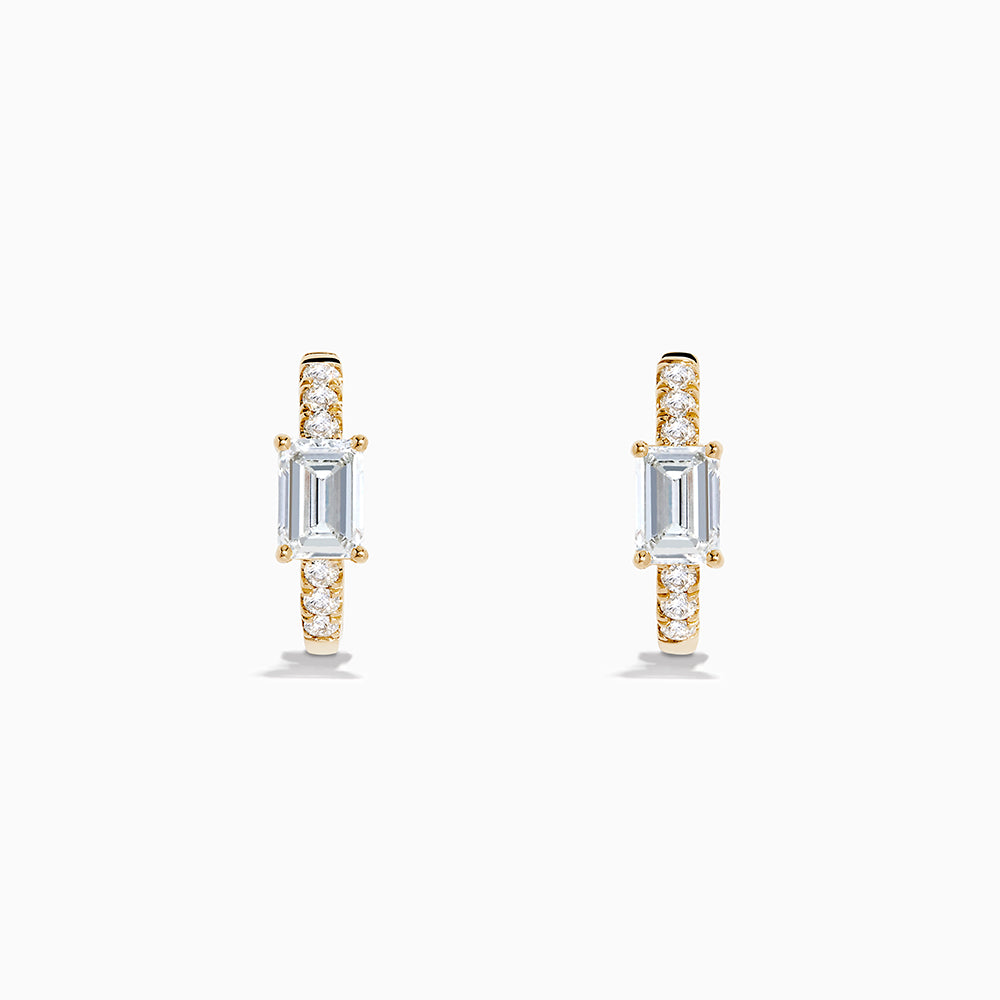 Lab Grown Diamond Emerald-Cut Huggie Earrings in 14K Yellow Gold, each with a central rectangular lab diamond and small round diamonds on the hoop, shown on a white background.