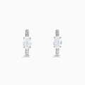 Lab Grown Diamond Oval Huggie Earrings in 14K White Gold, featuring sparkling lab diamonds set along sleek hoops, displayed on a white background.