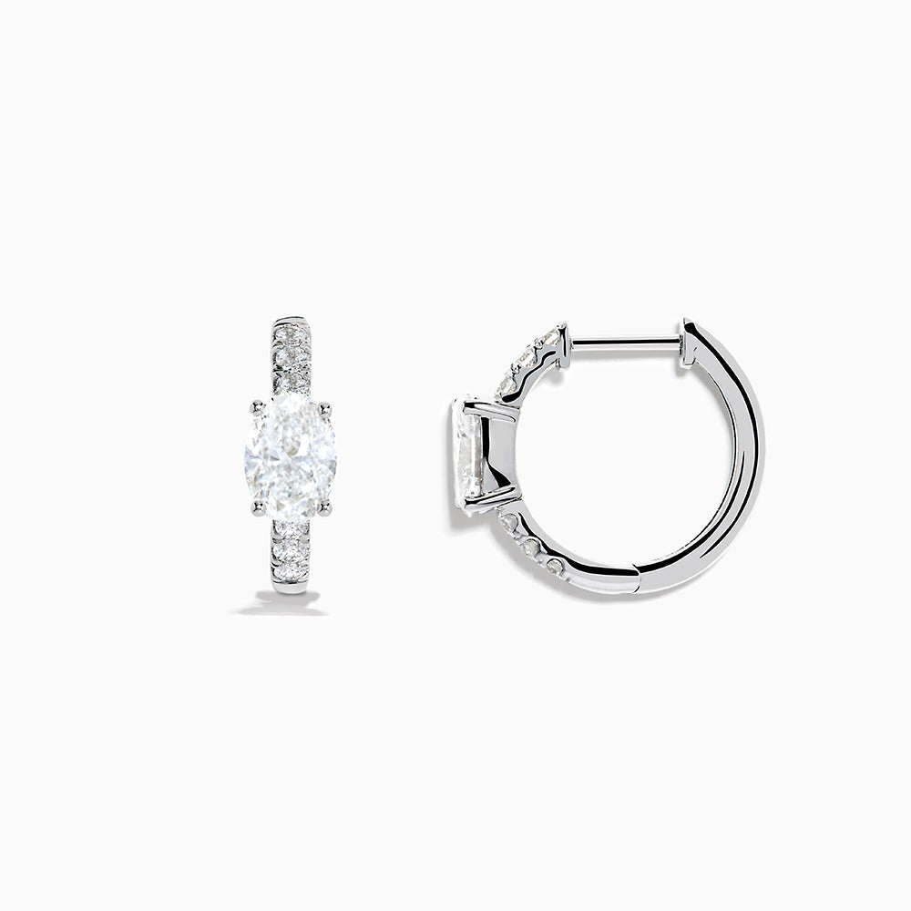 Lab Grown Diamond Oval Huggie Earrings in 14K White Gold, featuring sparkling lab diamonds set along sleek hoops, displayed on a white background.