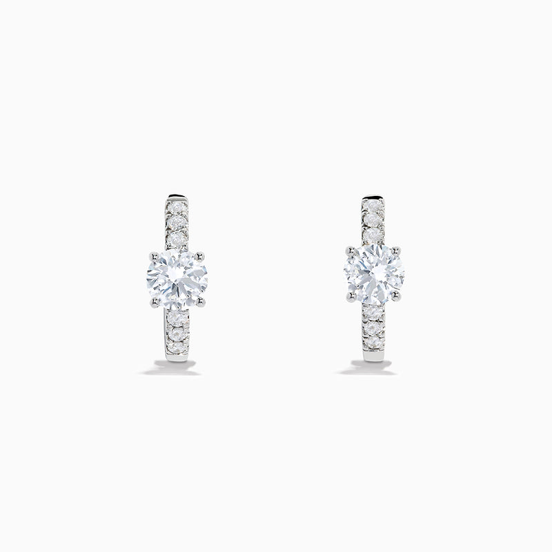 Lab Grown Diamond Round Huggie Earrings in 14K White Gold, featuring a central round diamond with vertical rows of smaller diamonds, displayed on a plain white background.