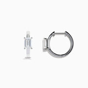 A pair of Lab Grown Diamond Emerald-Cut Huggie Earrings in 14K White Gold, each featuring a vertically set emerald-cut lab diamond at the front, displayed against a plain white background.