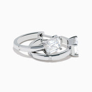 A pair of Lab Grown Diamond Emerald-Cut Huggie Earrings in 14K White Gold, each featuring a vertically set emerald-cut lab diamond at the front, displayed against a plain white background.