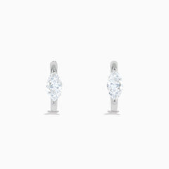The Lab Grown Diamond Marquise Huggie Earrings in 14K White Gold are shown against a plain white background.
