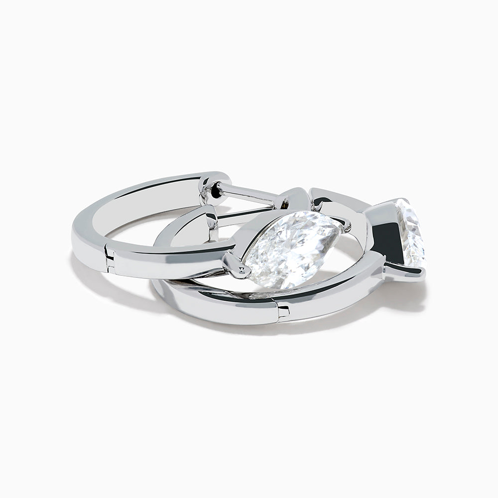 The Lab Grown Diamond Marquise Huggie Earrings in 14K White Gold are shown against a plain white background.