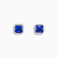 The Nahla Siri 14K Gold Tanzanite and Diamond Earrings feature square-cut tanzanite studs, each haloed by sparkling diamonds, set in luxurious 14K gold against a plain white background.