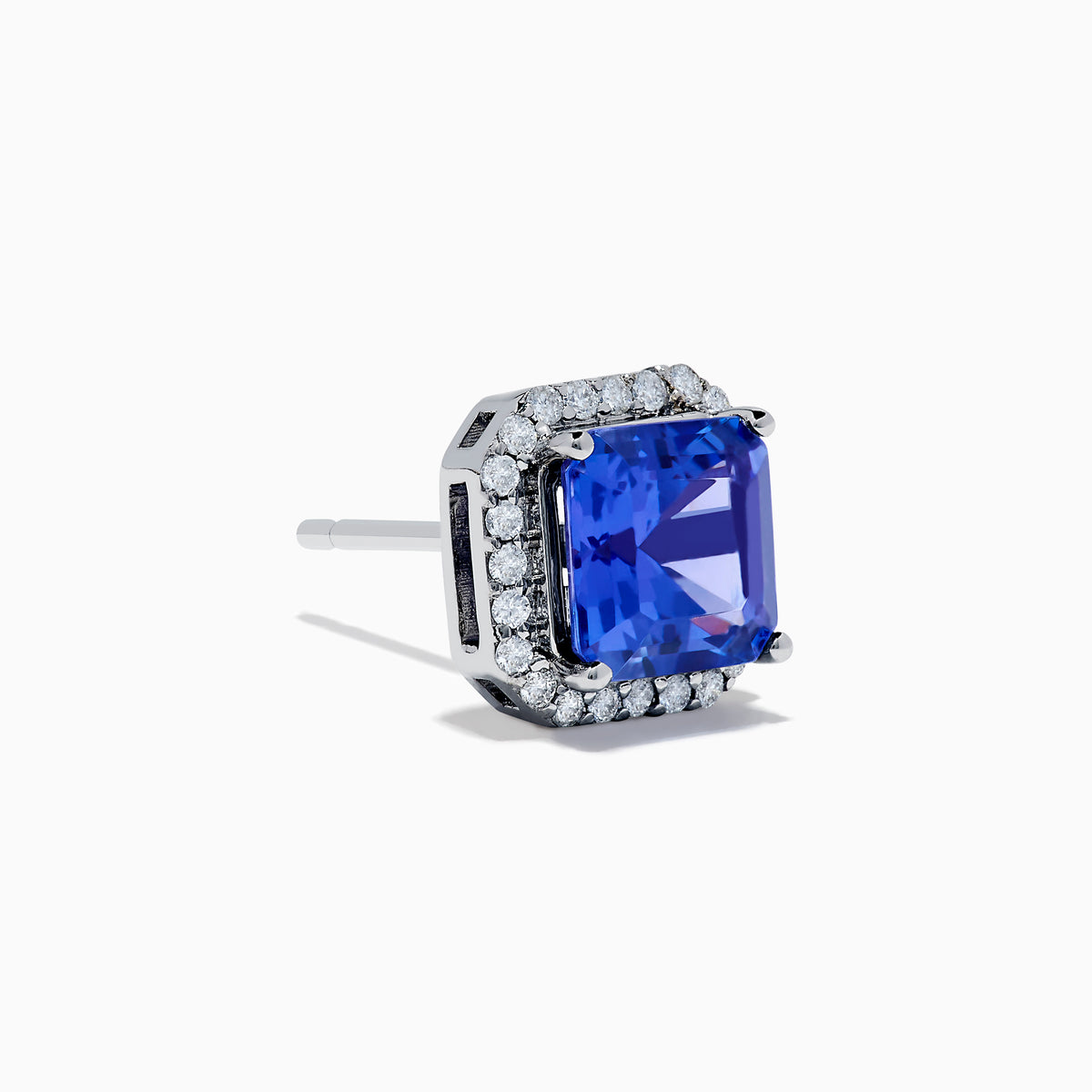 The Nahla Siri 14K Gold Tanzanite and Diamond Earrings feature square-cut tanzanite studs, each haloed by sparkling diamonds, set in luxurious 14K gold against a plain white background.