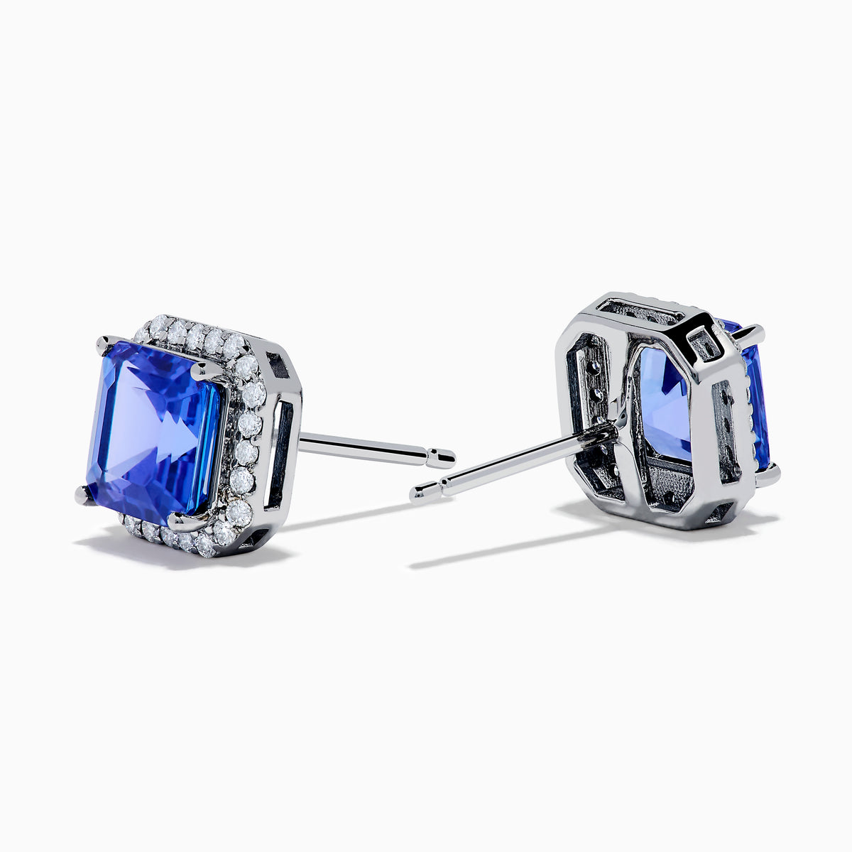 The Nahla Siri 14K Gold Tanzanite and Diamond Earrings feature square-cut tanzanite studs, each haloed by sparkling diamonds, set in luxurious 14K gold against a plain white background.