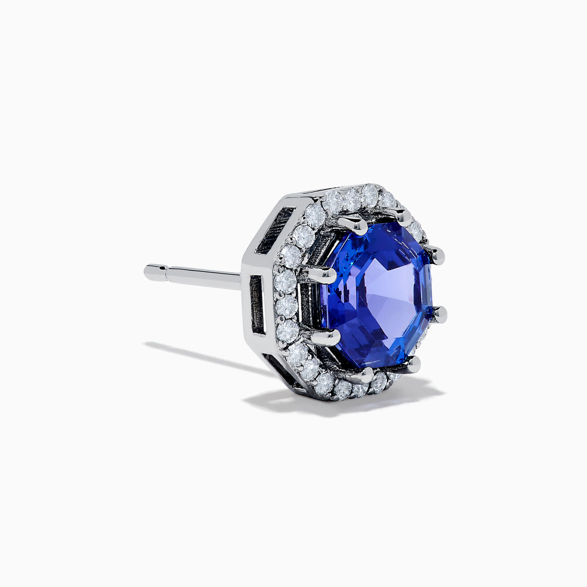 The Nahla Siri 14K Gold Octagon Cut Tanzanite and Diamond Earrings feature octagonal tanzanite gemstones encircled by small clear diamonds, set against a plain white background.