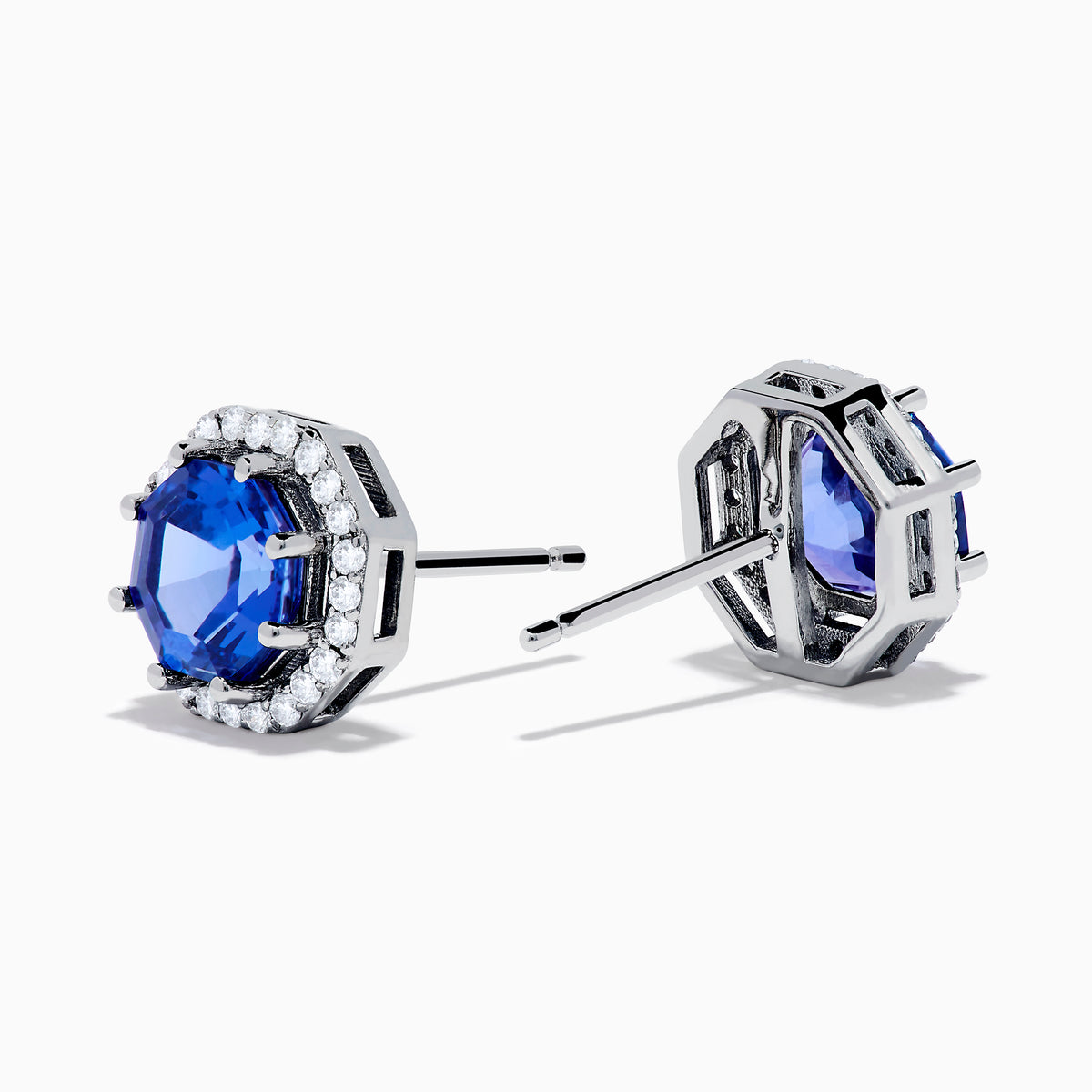 The Nahla Siri 14K Gold Octagon Cut Tanzanite and Diamond Earrings feature octagonal tanzanite gemstones encircled by small clear diamonds, set against a plain white background.