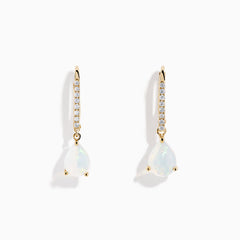 Aurora 14K Yellow Gold Opal and Diamond Dangle Earrings feature teardrop opals hanging from curved hooks with round diamonds, shown on a white background.